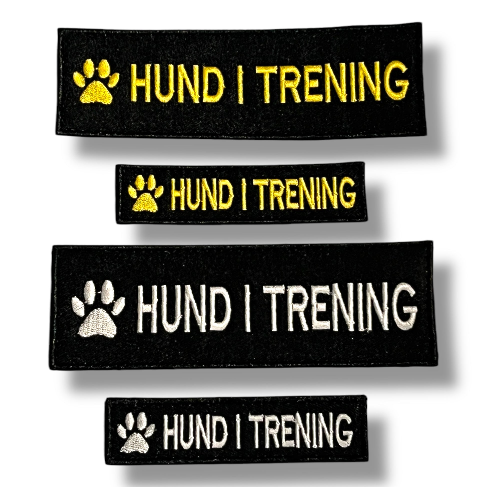 Merker som viser hund i trening