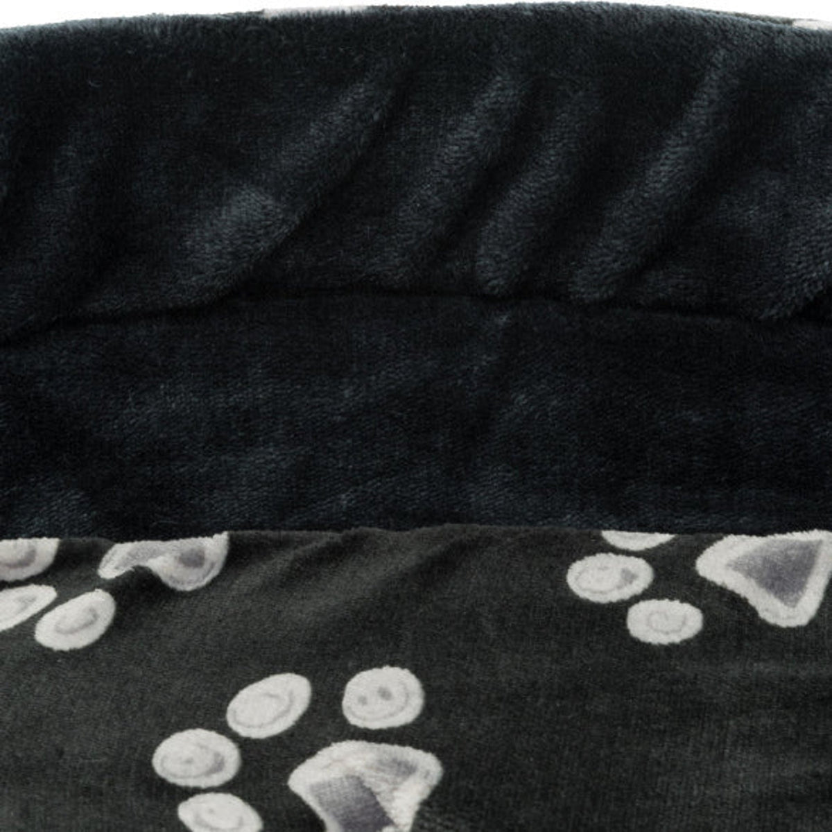 Nærbilde av hundeseng Jimmy i softplysj med poter, sort